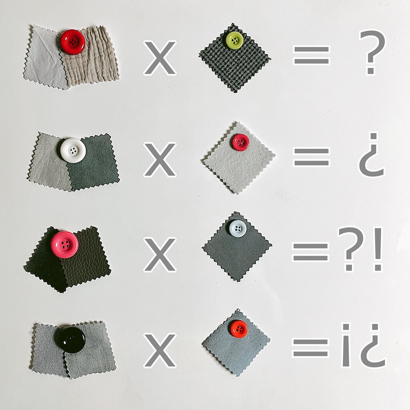 Verschiedene Stoffbeschnitte mit Knöpfen in mathematischen Formeln eingesetzt.